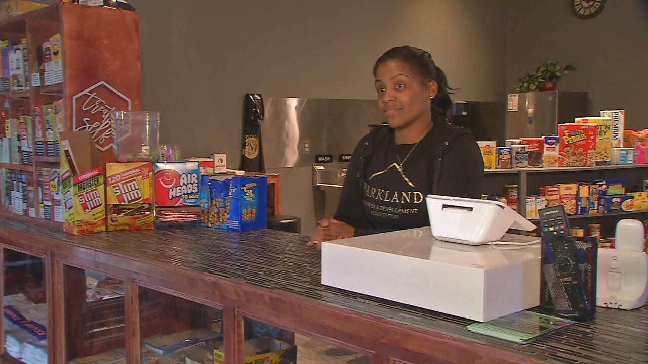 Tammy Hawkins at her food mart in west Louisville